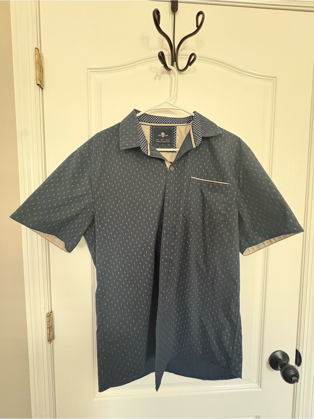 Craft Men's Blue Short-Sleeve Polo with Subtle Dot Pattern